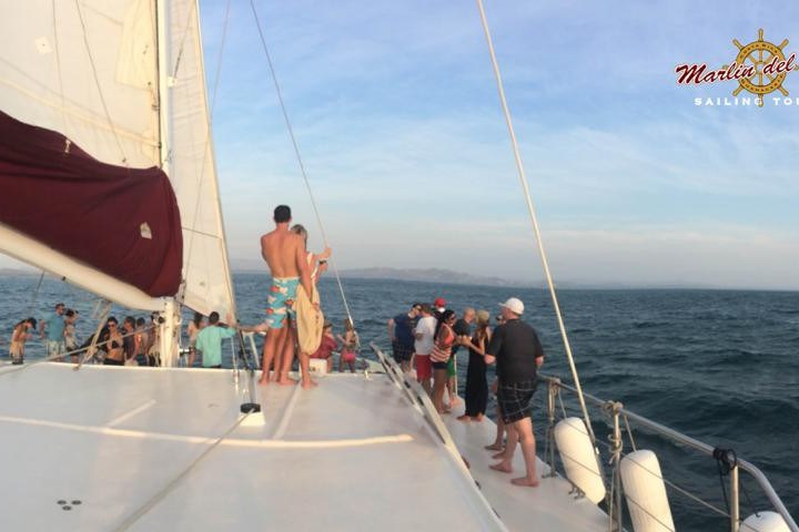 Tourists on deck of catamaran