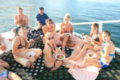 Guests eating on Marlin del Rey catamaran