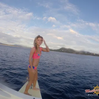 Girl on board catamaran