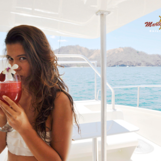 Girl drinking on private Marlin del Rey catamaran tour