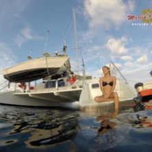 Girl on board catamaran